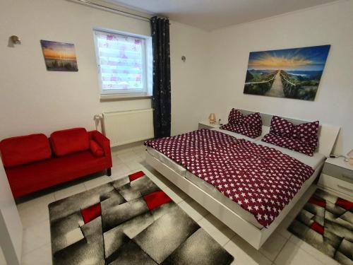 En eller flere senge i et værelse på Ferienhaus Regina im Bohnental