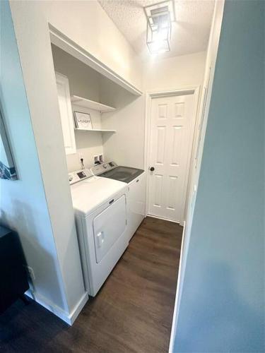 A kitchen or kitchenette at Modern Rocket City Condo -- 3 min to Mid-City