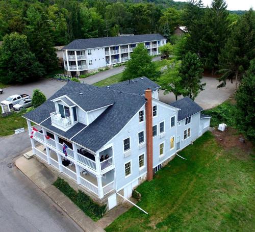 an aerial view of a large white house at South Landing Inn in Niagara on the Lake