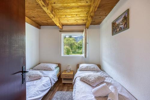 Postel nebo postele na pokoji v ubytování Holiday home Veki***