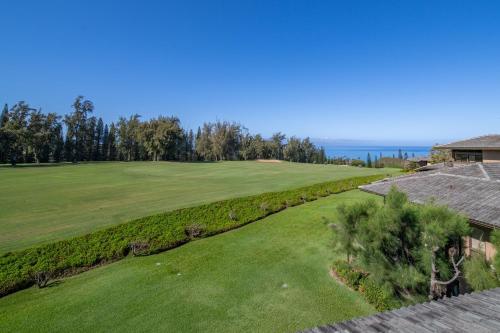 a view of the golf course from the roof of a house at Kapalua Villas Maui - Select Your Unit in Kahana