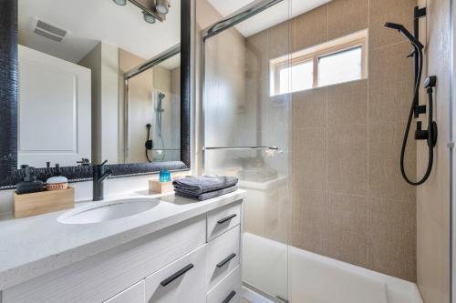 a bathroom with a sink and a shower at Minimal - 30 nights minimum in Vancouver