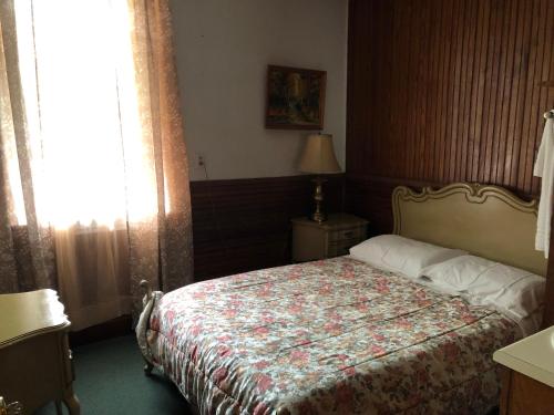 Llit o llits en una habitació de Rota Lodge