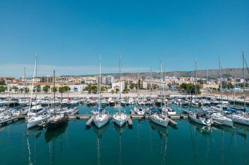 a bunch of boats are docked in a harbor at Marina del Gargano Houseboat in Manfredonia
