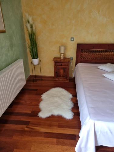 Postel nebo postele na pokoji v ubytování Antik