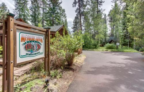 a sign for the entrance to a cabin at Metolius Cabin 6 in Camp Sherman