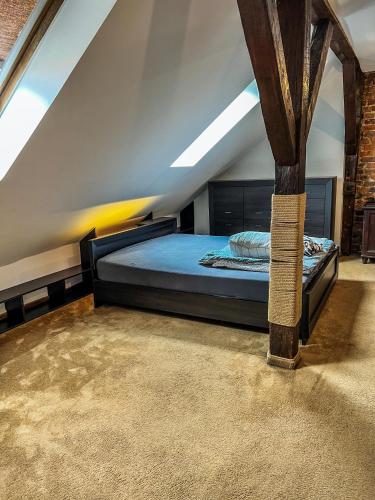 Postel nebo postele na pokoji v ubytování Apartment by centrum