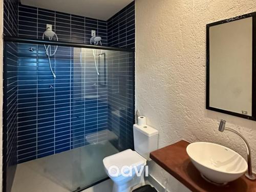 ห้องน้ำของ Qavi - Triplex com duas Piscinas privativas