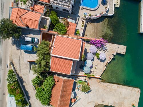 an overhead view of a building next to the water at Apartments Novo Mulo in Tivat