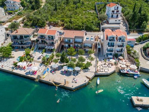 an aerial view of a resort on the water at Apartments Edera in Tivat
