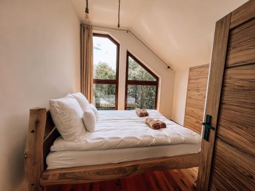 Postel nebo postele na pokoji v ubytování Marina Olchowiec - Villa