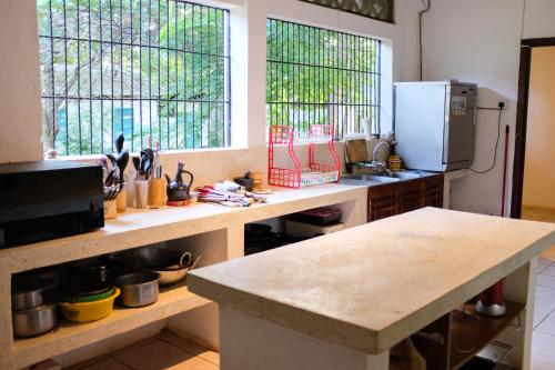 Kuchyň nebo kuchyňský kout v ubytování Angelina (@ Home of Halwaridi)