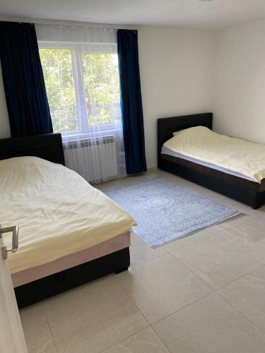 Кровать или кровати в номере Cherry Apartments