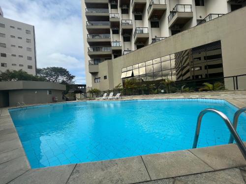 Bazén v ubytovaní Flat Premium -Acesso a pé ao shopping Center vale - Edifício Summit (Ar condicionado) alebo v jeho blízkosti