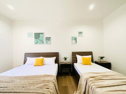 Postel nebo postele na pokoji v ubytování Mangrove Residences Mactan