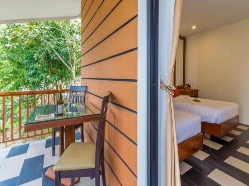 Postel nebo postele na pokoji v ubytování 360 Resort