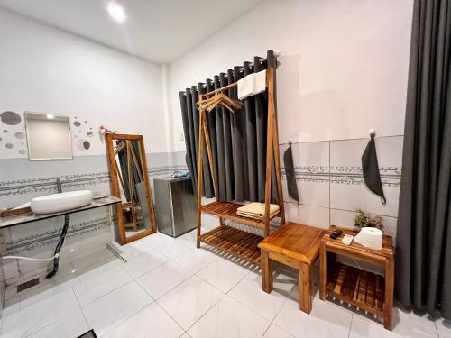 a bathroom with a sink and a mirror at SOHO 1 PHÚ QUỐC in Phu Quoc