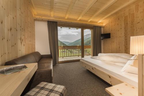 Postel nebo postele na pokoji v ubytování Hotel Panorama