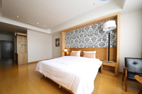 Postel nebo postele na pokoji v ubytování Lake 45 Hotel