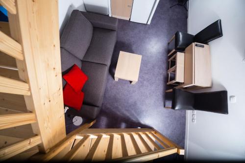 an overhead view of a room with a bunk bed at Gold Beach Hotel & RESIDENCE in Asnelles