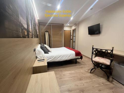 TV a/nebo společenská místnost v ubytování Hotel Venta Magullo