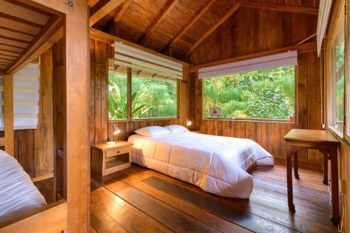 Postel nebo postele na pokoji v ubytování La Providencia Lodge