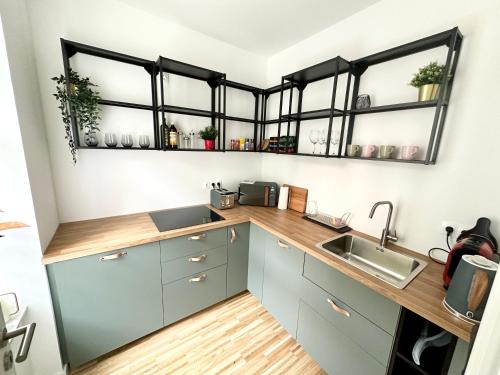 Nhà bếp/bếp nhỏ tại Wohlfühloase im hippen Leipziger Osten