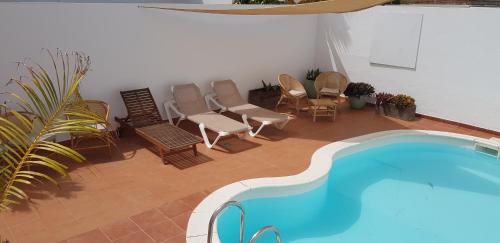 The swimming pool at or close to Arena Blanca