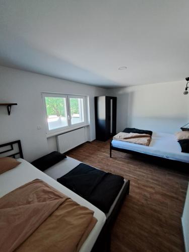 Postel nebo postele na pokoji v ubytování Apartment Šelih