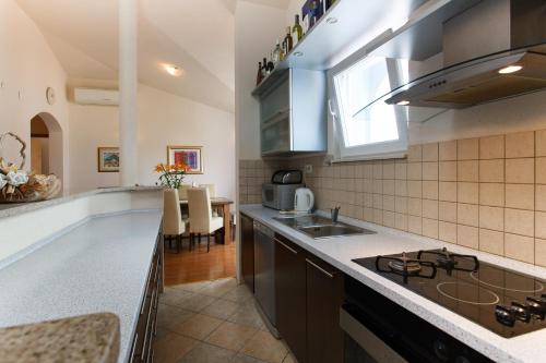 Η κουζίνα ή μικρή κουζίνα στο Apartment Gold