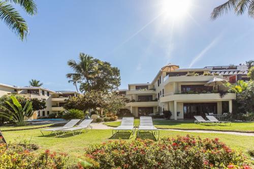 Un jardín fuera de Cabarete Palm Beach Condos