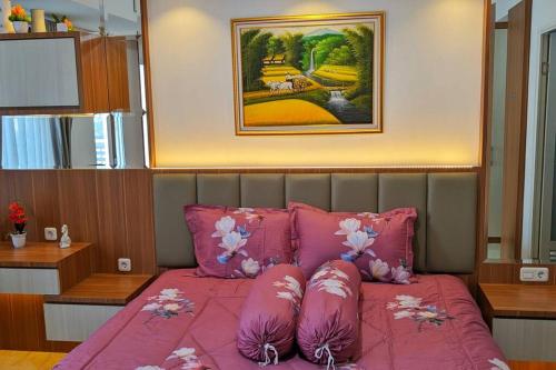 Khu vực ghế ngồi tại The cozy & luxury room in Podomoro City Deli Medan