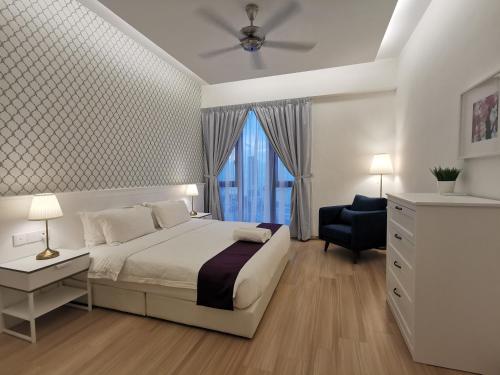 Tempat tidur dalam kamar di Jazz Service Suite Tanjung Tokong