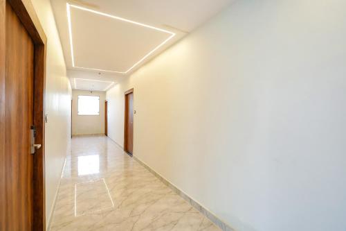 a hallway with a skylight in a building at Hotel DDS in Lucknow