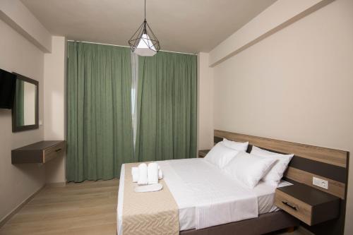 Ένα ή περισσότερα κρεβάτια σε δωμάτιο στο Apanemo Kourouta Luxury Double Room