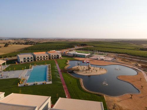 an aerial view of a resort with a water park at Vila Gale Nep Kids in Beja