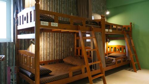Μία ή περισσότερες κουκέτες σε δωμάτιο στο Lovely Bean Hostel
