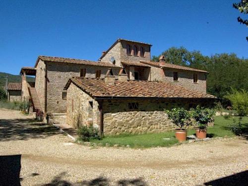 an old stone building with at Authentic holiday home in Bucine with swimming pool in Ambra