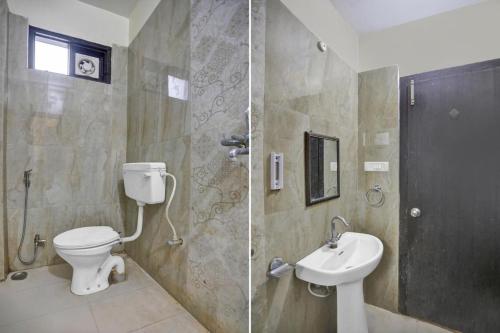 ein Bad mit einem WC, einem Waschbecken und einer Dusche in der Unterkunft Hotel Kamdhenu inn Prayagraj in Lukerganj