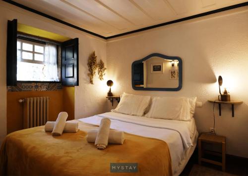 Krevet ili kreveti u jedinici u okviru objekta MyStay - Casa de Abbades