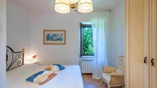 Ένα ή περισσότερα κρεβάτια σε δωμάτιο στο VILLA BANCI 8, Emma Villas
