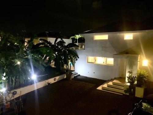 an aerial view of a house at night at Villa à 100 m à pied de la plage in Sainte-Anne