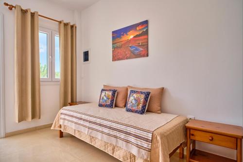 Ένα ή περισσότερα κρεβάτια σε δωμάτιο στο Stacys Apartments near Sidari