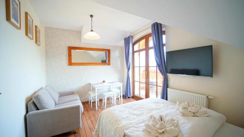 Posteľ alebo postele v izbe v ubytovaní Apartamenty EverySky - Obrońców Pokoju 1D