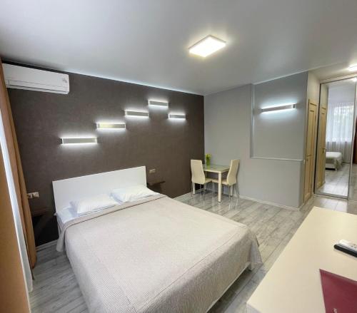 Ένα ή περισσότερα κρεβάτια σε δωμάτιο στο East Residence Gray