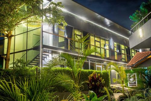 a building with a lot of plants in front of it at Gigiri Lion Villas I in Nairobi
