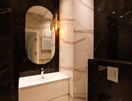 Koupelna v ubytování Apartament Bulwar Staromiejski Stare Miasto Centrum