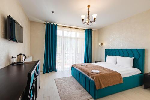 Кровать или кровати в номере Gold Palace Wellness & Spa