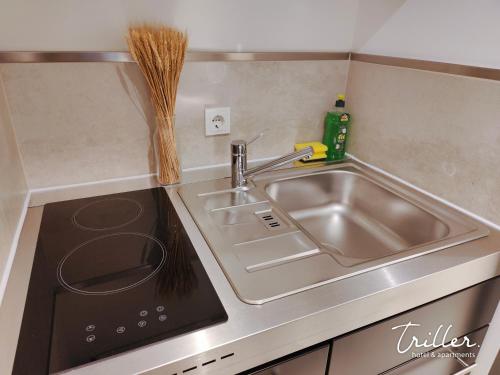 Köök või kööginurk majutusasutuses Stay by Triller - Aparthotel & Pool
