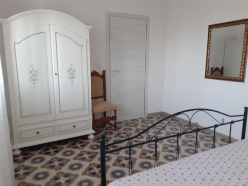 Säng eller sängar i ett rum på Casa Rosa 12 beds a few minutes from Leuca, Castro Otranto Gallipoli Torrevado